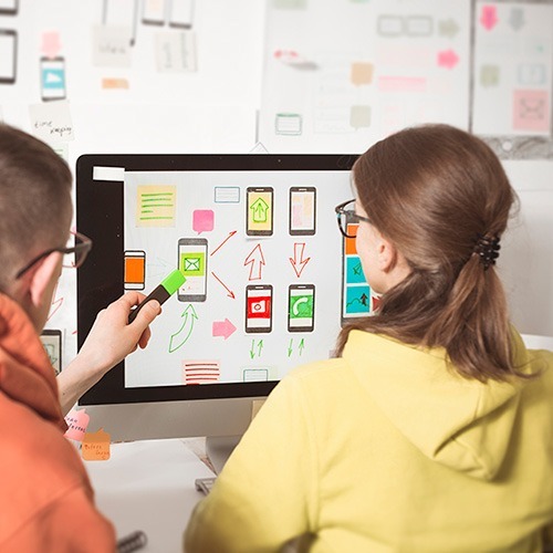 Employee Working As A UX UI Designers in Office, Delimp.com